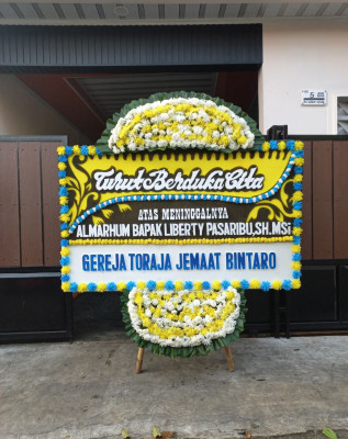Papan Bunga Duka di Palasari